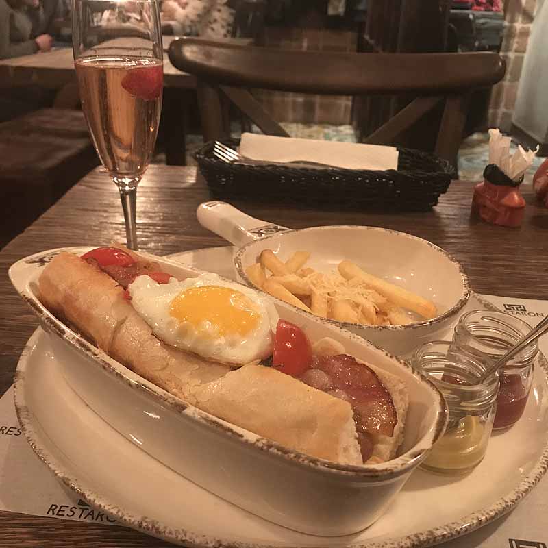 hot dog and champagne in lviv, ukraine