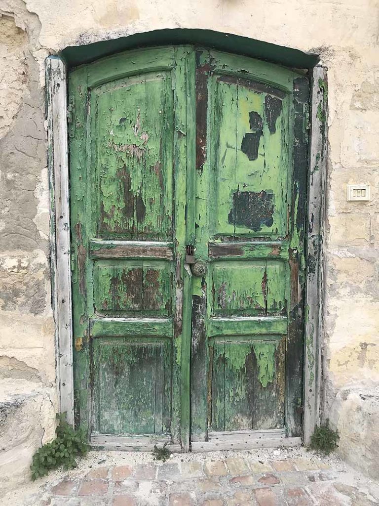green door in matera, italy